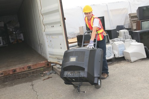 Office furniture being removed by clearance experts